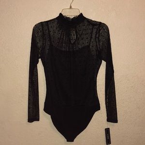 Sheer black bodysuit